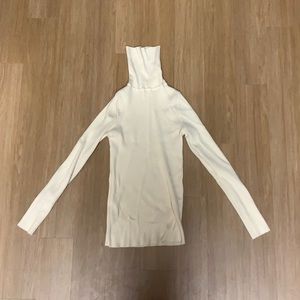 cream colored turtleneck